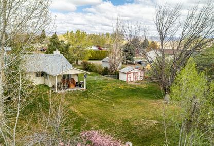 Mountain Home Idaho home with large backyard and mature trees