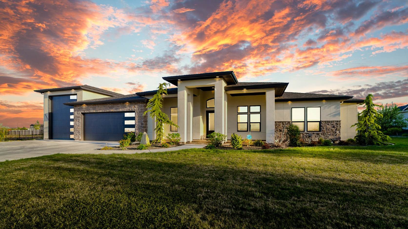 Custom luxury home on acreage in Nampa, Idaho, photographed at sunset. This $1 million-plus property was sold by Judit Crace of Top Idaho Real Estate.